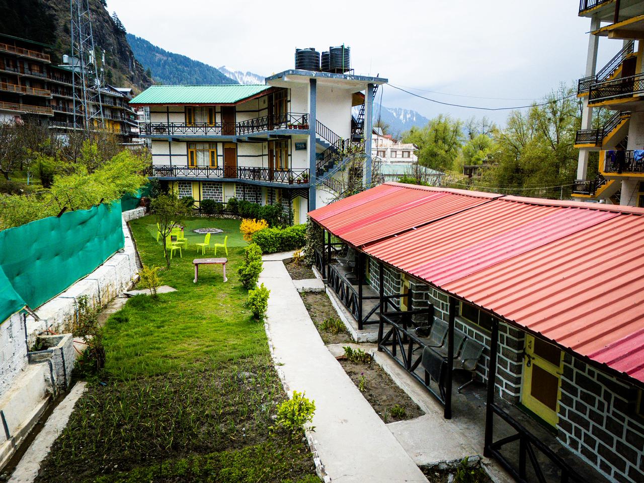 Hotel Seraj garden pathway and mountain view
